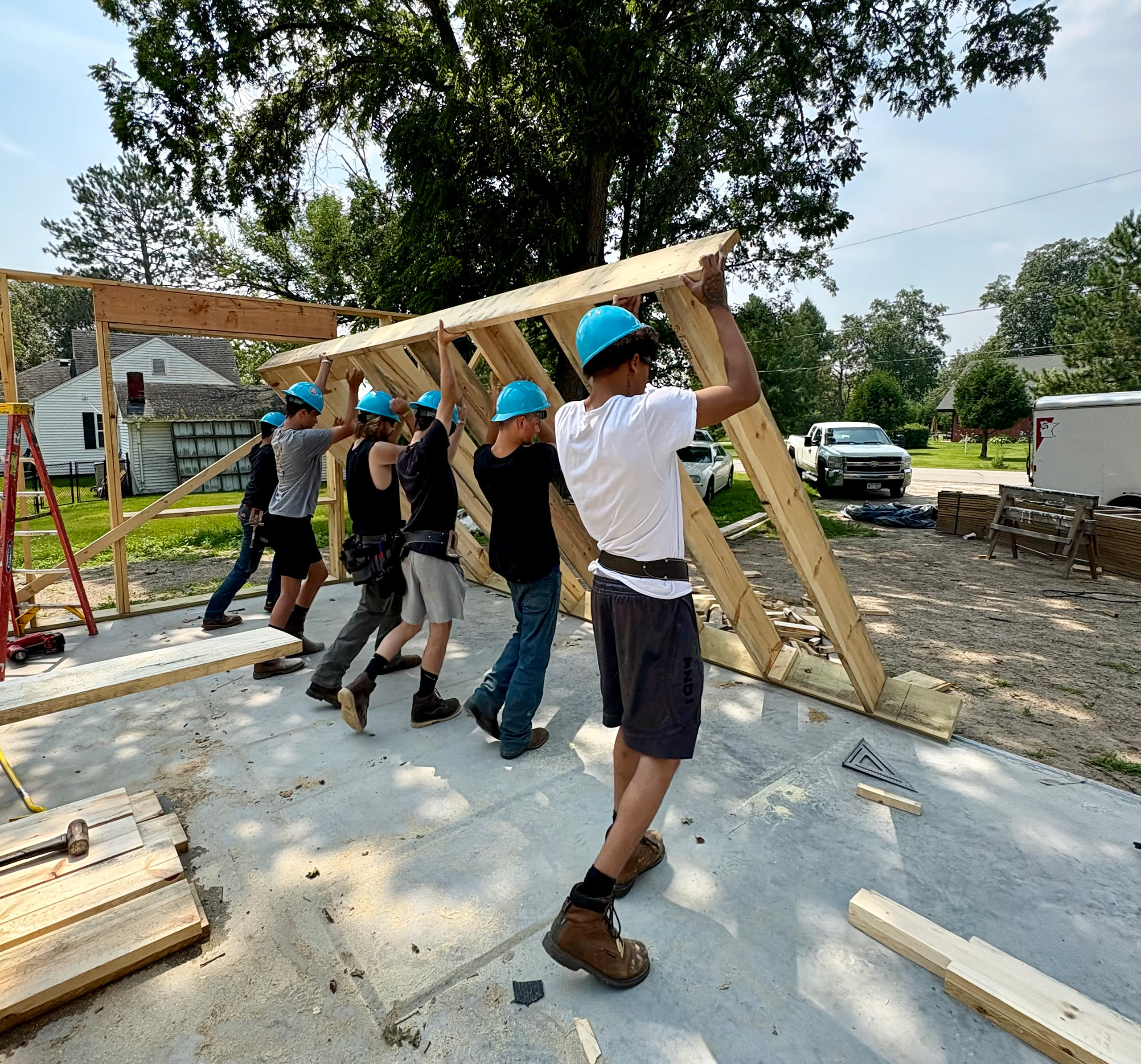 AEOA YouthBuild volunteers help with an Itasca Habitat build