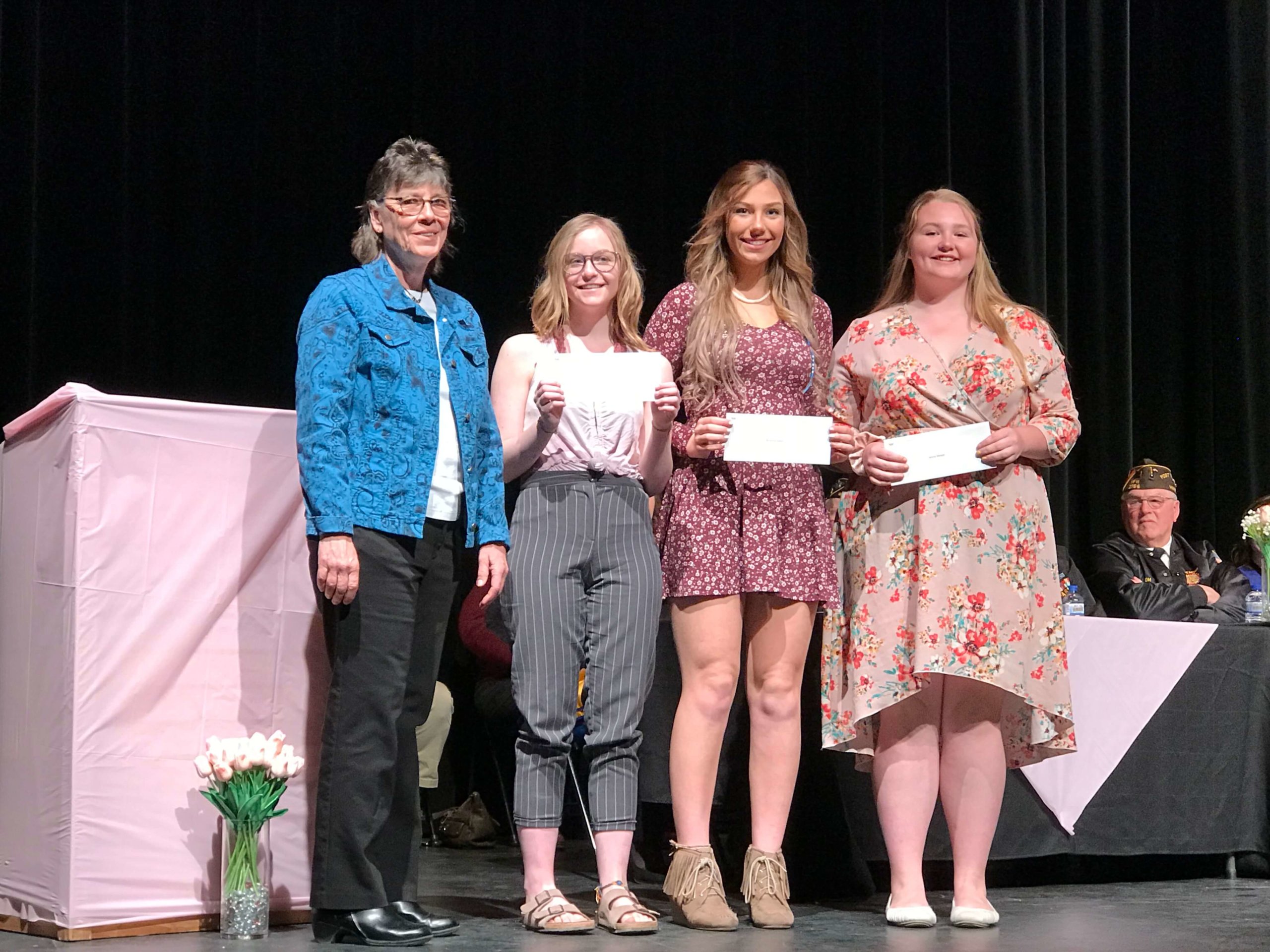 Dr. Heidi Korstad, chair of Blandin Foundation's board of trustees, presented awards to graduates of Bigfork High School.