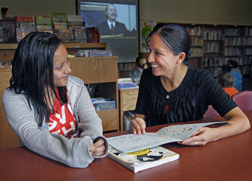 PelicanRpz_WomenLibraryTable10437