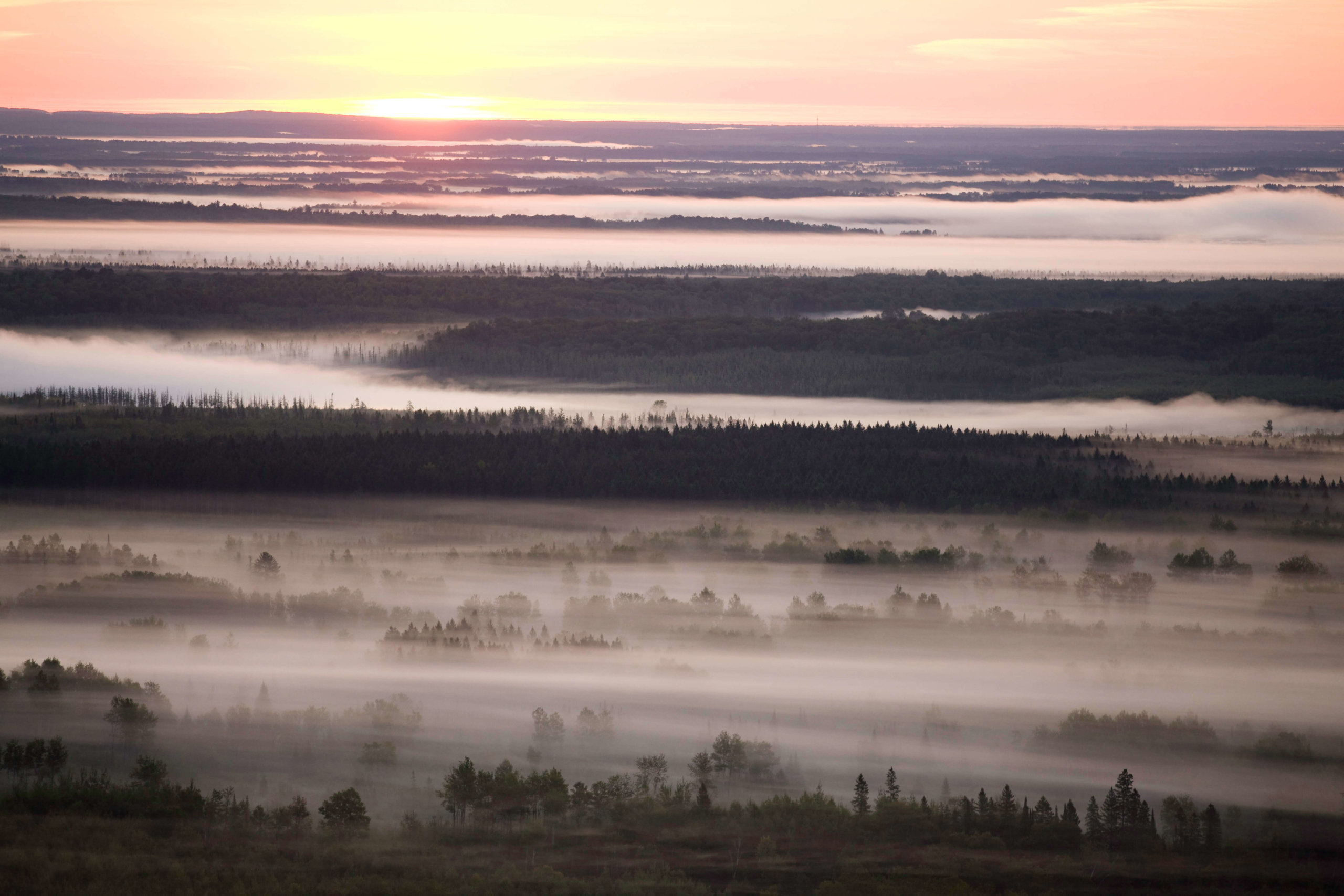 Aerial view ground fog at dawn on UPM/Blandin forest land in Itasca County, Minnesota.